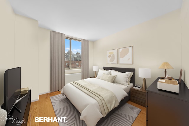 bedroom featuring light wood finished floors
