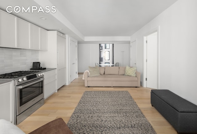 111 Montgomery St Unit 5R, New York City, NY 11225 - living area with light wood-type flooring and recessed lighting