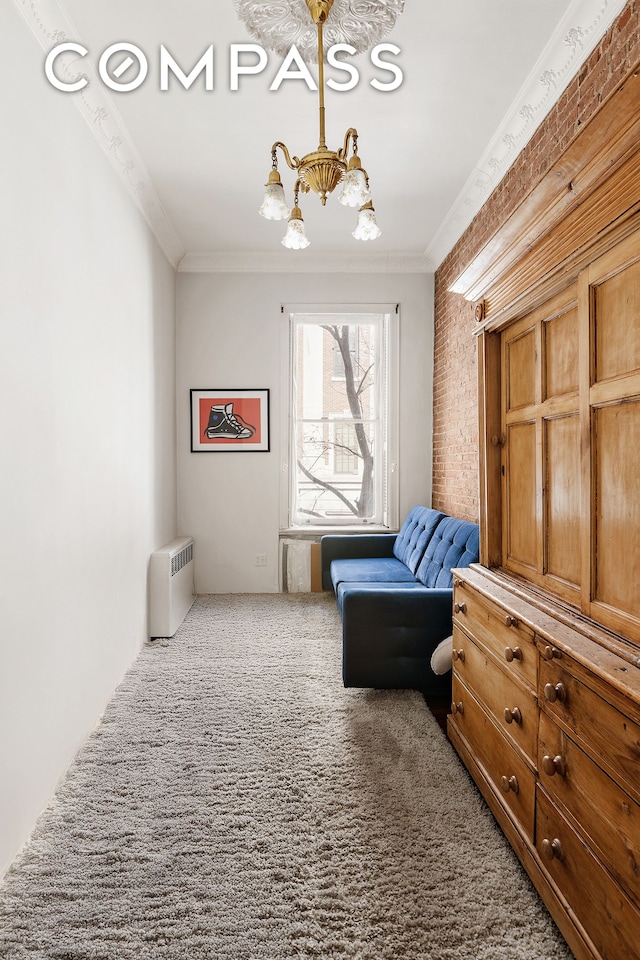 138 W 73rd St, New York City, NY 10023 - sitting room with carpet, a chandelier, and crown molding