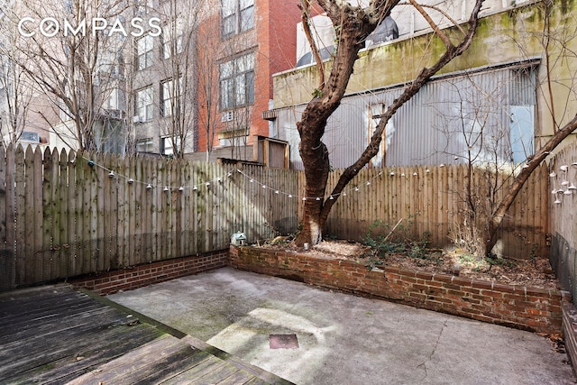138 W 73rd St, New York City, NY 10023 - view of patio / terrace with a fenced backyard