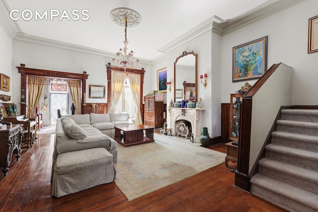 138 W 73rd St, New York City, NY 10023 - living room featuring stairway, wood finished floors, and crown molding