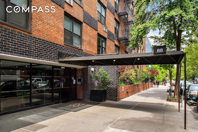 88 Bleecker St Unit 6C, New York City, NY 10012 - view of property featuring covered parking