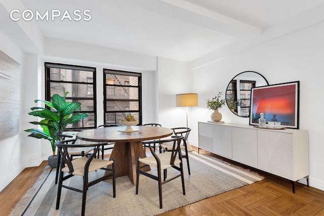 151 E 83rd St Unit 4Gh, New York City, NY 10028 - dining space featuring baseboards