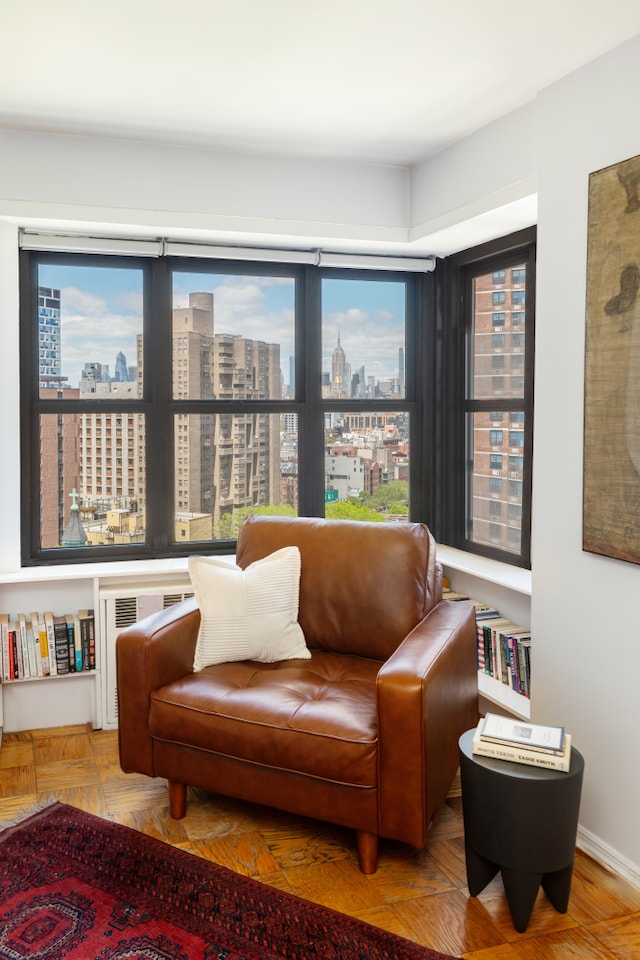 living area with a city view and healthy amount of natural light