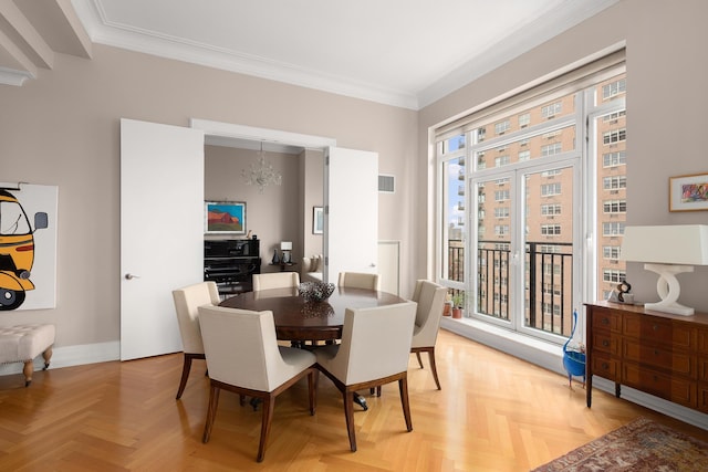205 E 85th St Unit Ph2B, New York City, NY 10028 - dining space with crown molding and baseboards