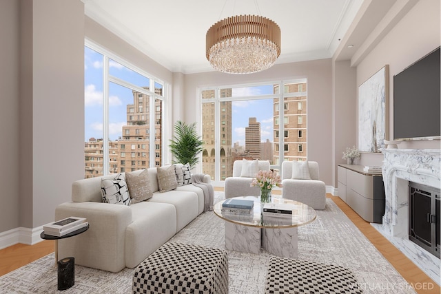 205 E 85th St Unit Ph2B, New York City, NY 10028 - living area with a chandelier, a city view, ornamental molding, and light wood-type flooring