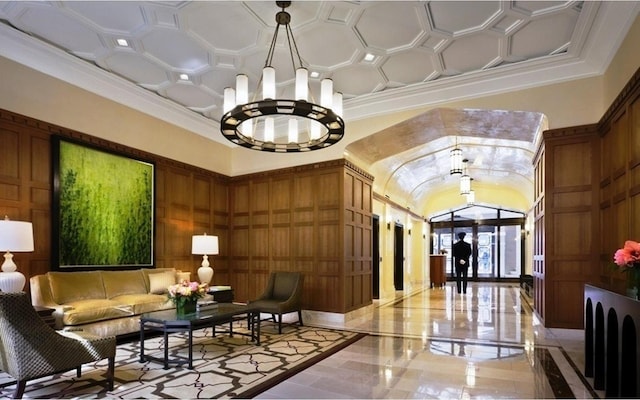 205 E 85th St Unit Ph2B, New York City, NY 10028 - lobby with crown molding, coffered ceiling, and wooden walls