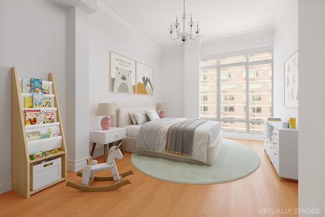 205 E 85th St Unit Ph2B, New York City, NY 10028 - bedroom with crown molding, light wood-style floors, and a chandelier