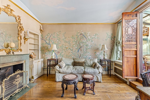 71 Park Ave Phb, Phb, New York City, NY 10016 - living area with lofted ceiling, wood finished floors, a high end fireplace, and wallpapered walls