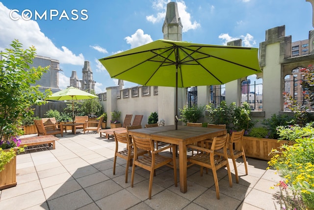 view of patio / terrace with fence and outdoor dining space