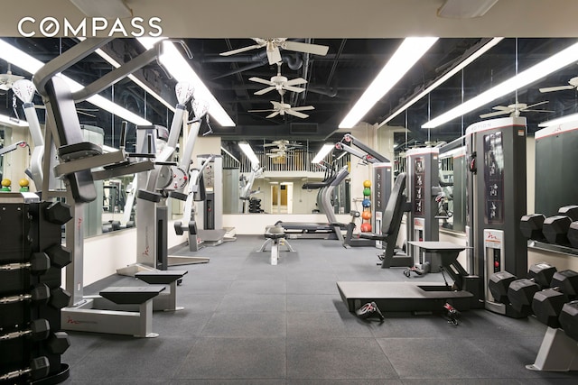 workout area featuring a ceiling fan