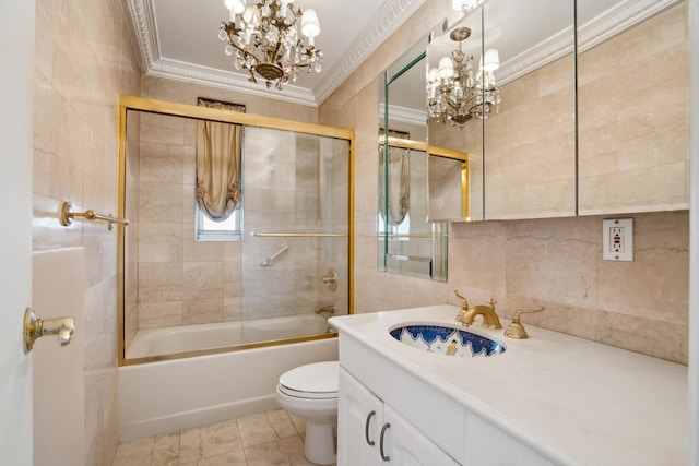 33 E End Ave Unit 2B, New York City, NY 10028 - full bath featuring a chandelier, vanity, crown molding, enclosed tub / shower combo, and tile walls