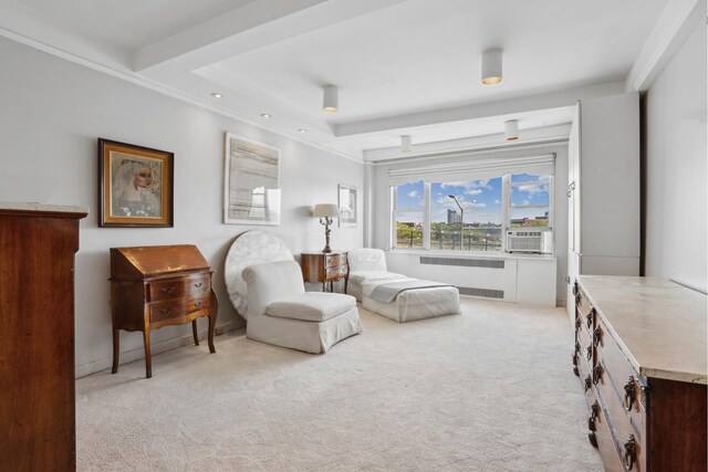 33 E End Ave Unit 2B, New York City, NY 10028 - living area featuring radiator heating unit, light carpet, and recessed lighting