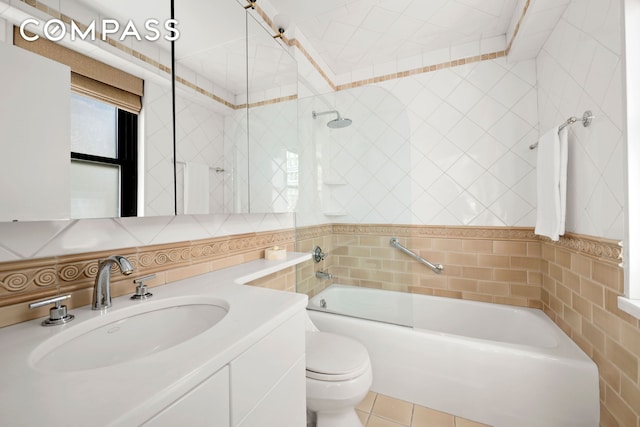 1065 Park Ave Unit 11A, New York City, NY 10128 - bathroom featuring tile walls, shower / bath combination, toilet, vanity, and tile patterned floors