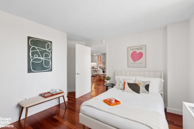 206 E 95th St Unit 12B, New York City, NY 10128 - bedroom featuring wood finished floors and baseboards