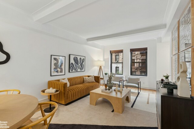 230 Riverside Dr Unit 3K, New York City, NY 10025 - living room featuring beamed ceiling and baseboards