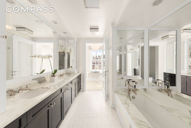 40 E 66th St Unit 12B, New York City, NY 10065 - bathroom featuring double vanity and a bath