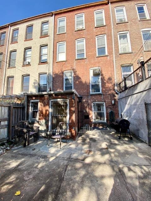 188 Mac Donough St, New York City, NY 11216 - back of house with brick siding and a patio area
