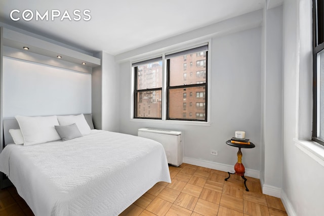 bedroom with baseboards