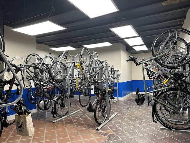 garage featuring bike storage and baseboards