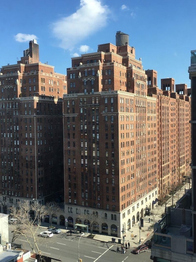 view of building exterior featuring a city view