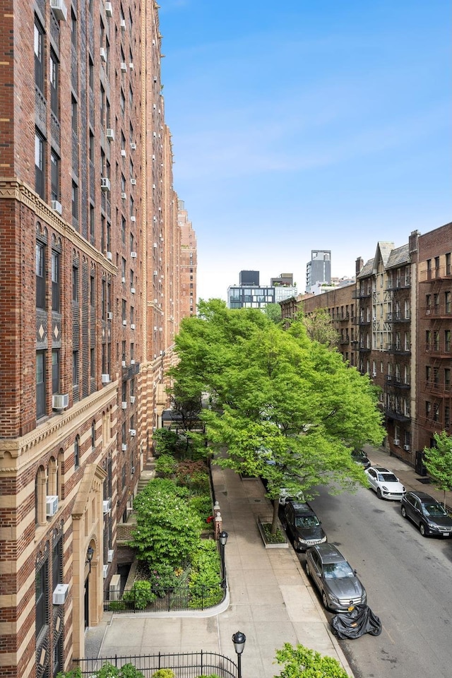 410 W 24th St Unit 4L, New York City, NY 10011 - view of building exterior with a view of city