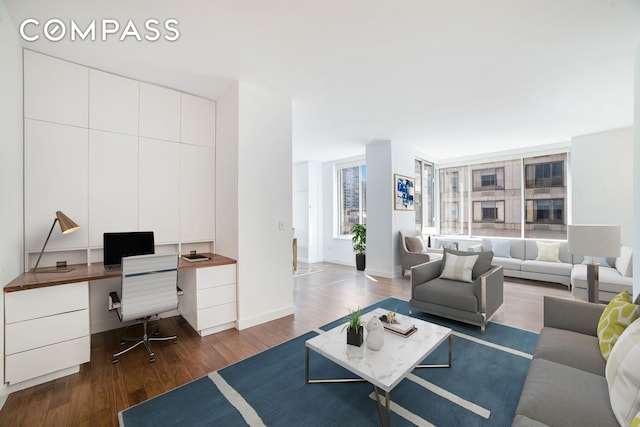 200 Riverside Blvd Unit 5Ef, New York City, NY 10069 - living area featuring dark wood finished floors and baseboards
