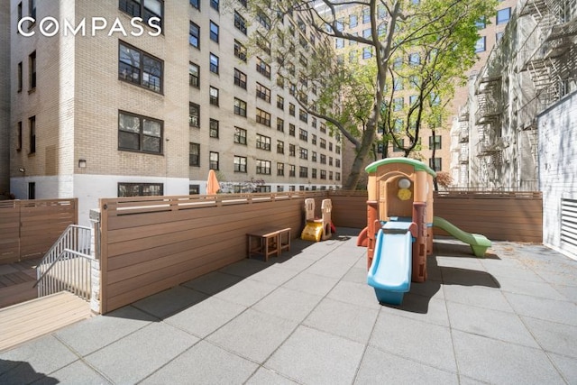 315 E 65th St Unit 1H, New York City, NY 10065 - view of patio with a gate