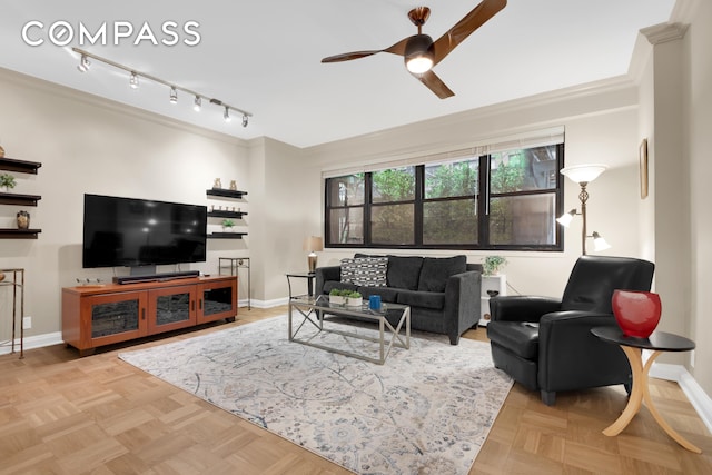 315 E 65th St Unit 1H, New York City, NY 10065 - living area featuring ceiling fan, crown molding, baseboards, and track lighting