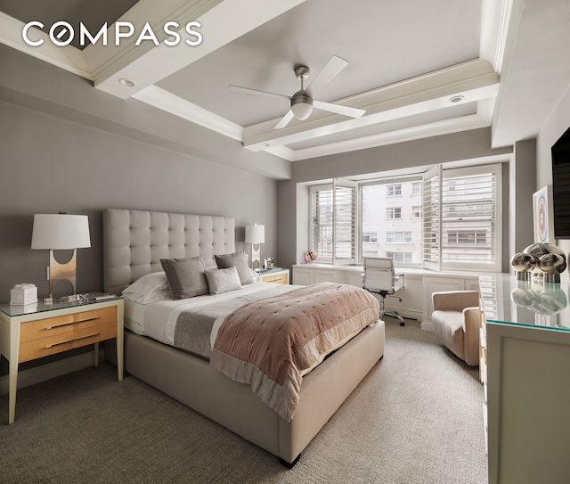 bedroom featuring ornamental molding, light carpet, a raised ceiling, an office area, and ceiling fan