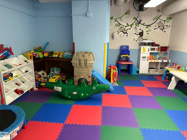 playroom featuring tile patterned floors