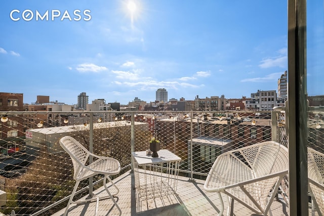 balcony featuring a view of skyline