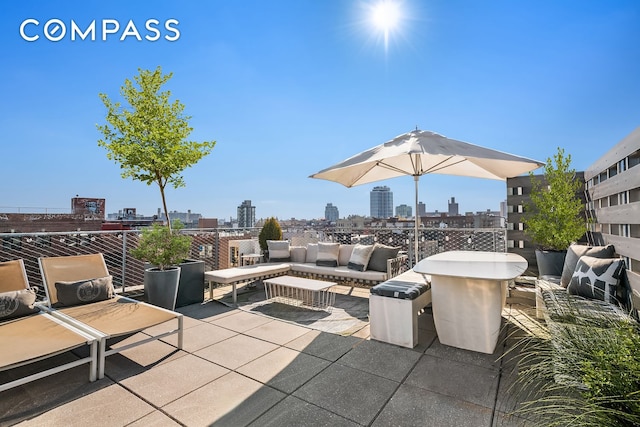 view of patio featuring a skyline view
