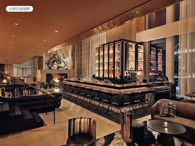 35 Hudson Yards Unit 5302, New York City, NY 10001 - indoor wet bar featuring wood finished floors