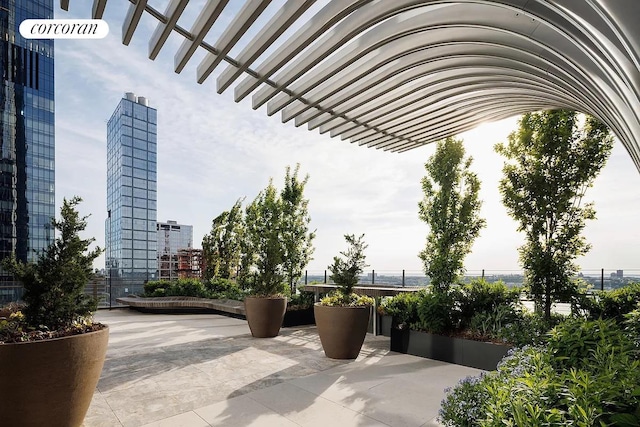 35 Hudson Yards Unit 5302, New York City, NY 10001 - view of patio featuring a city view