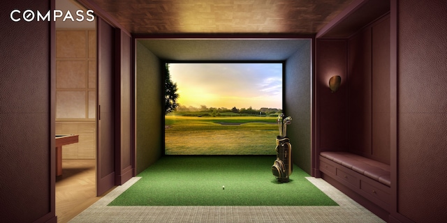 playroom with carpet and golf simulator