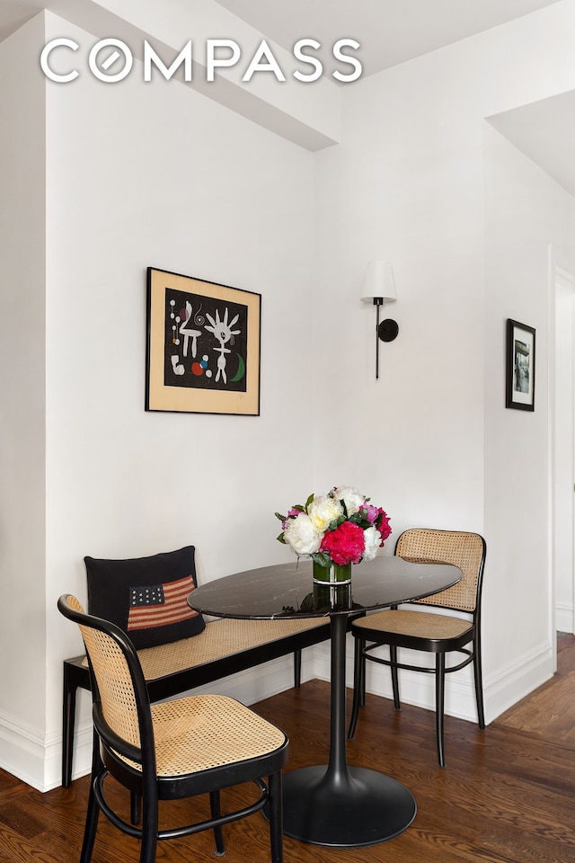 25 5th Ave Unit 8F, New York City, NY 10003 - dining area featuring baseboards and wood finished floors