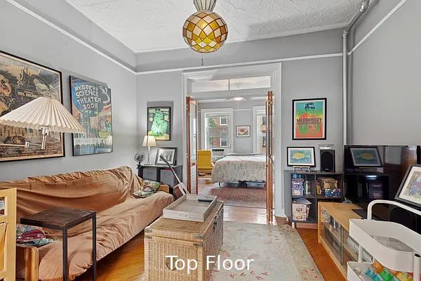 124 President St, New York City, NY 11231 - living area featuring wood finished floors