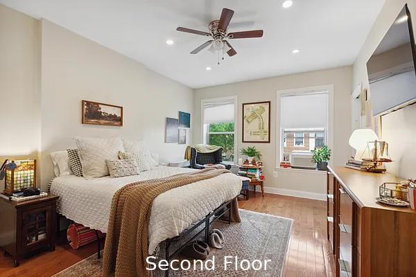 124 President St, New York City, NY 11231 - bedroom with wood finished floors, recessed lighting, and baseboards