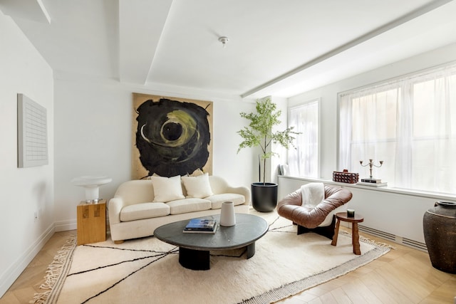 living room featuring baseboards