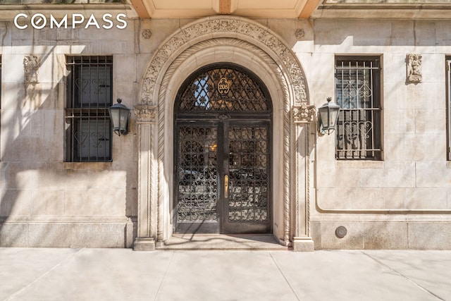 205 E 10th St Unit 3A, New York City, NY 10003 - doorway to property featuring stone siding