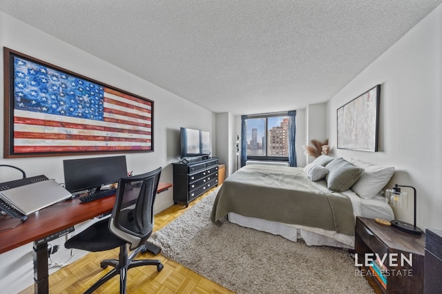 200 Rector Pl Unit 22D, New York City, NY 10280 - bedroom with a textured ceiling and an office area