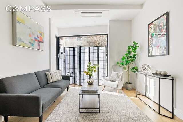 1251 Pacific St Unit 1A, New York City, NY 11216 - living room with wood finished floors