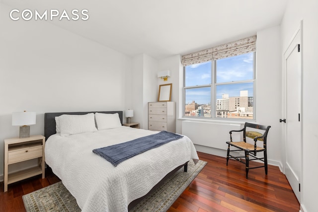 301 W 118th St Unit Ph1C, New York City, NY 10026 - bedroom featuring hardwood / wood-style floors and a city view