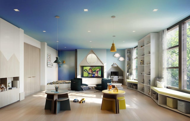 living room featuring wood finished floors and recessed lighting