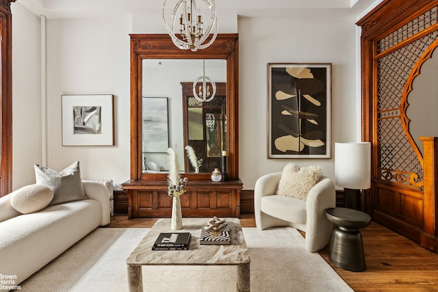221 W 113th St, New York City, NY 10026 - living room featuring a chandelier and wood finished floors