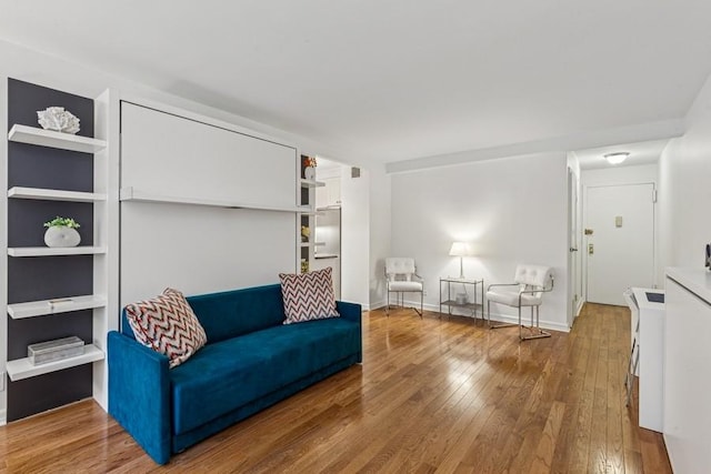 401 E 74th St Unit 2P, New York City, NY 10021 - living area with wood finished floors