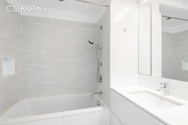 full bathroom featuring shower / bath combination and vanity