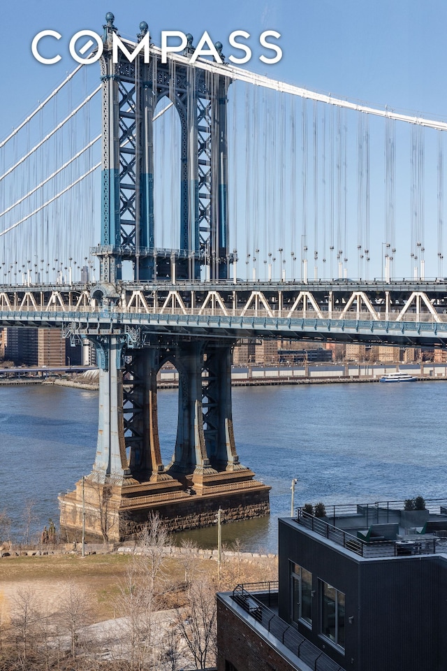 water view featuring a notable bridge