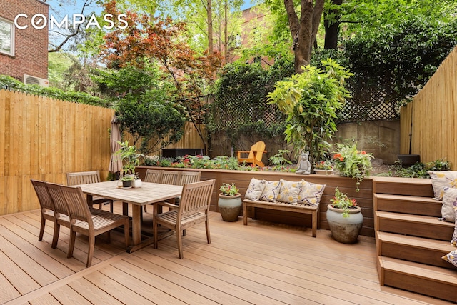 344 W 23rd St Unit 1E, New York City, NY 10011 - deck with a fenced backyard and outdoor dining space